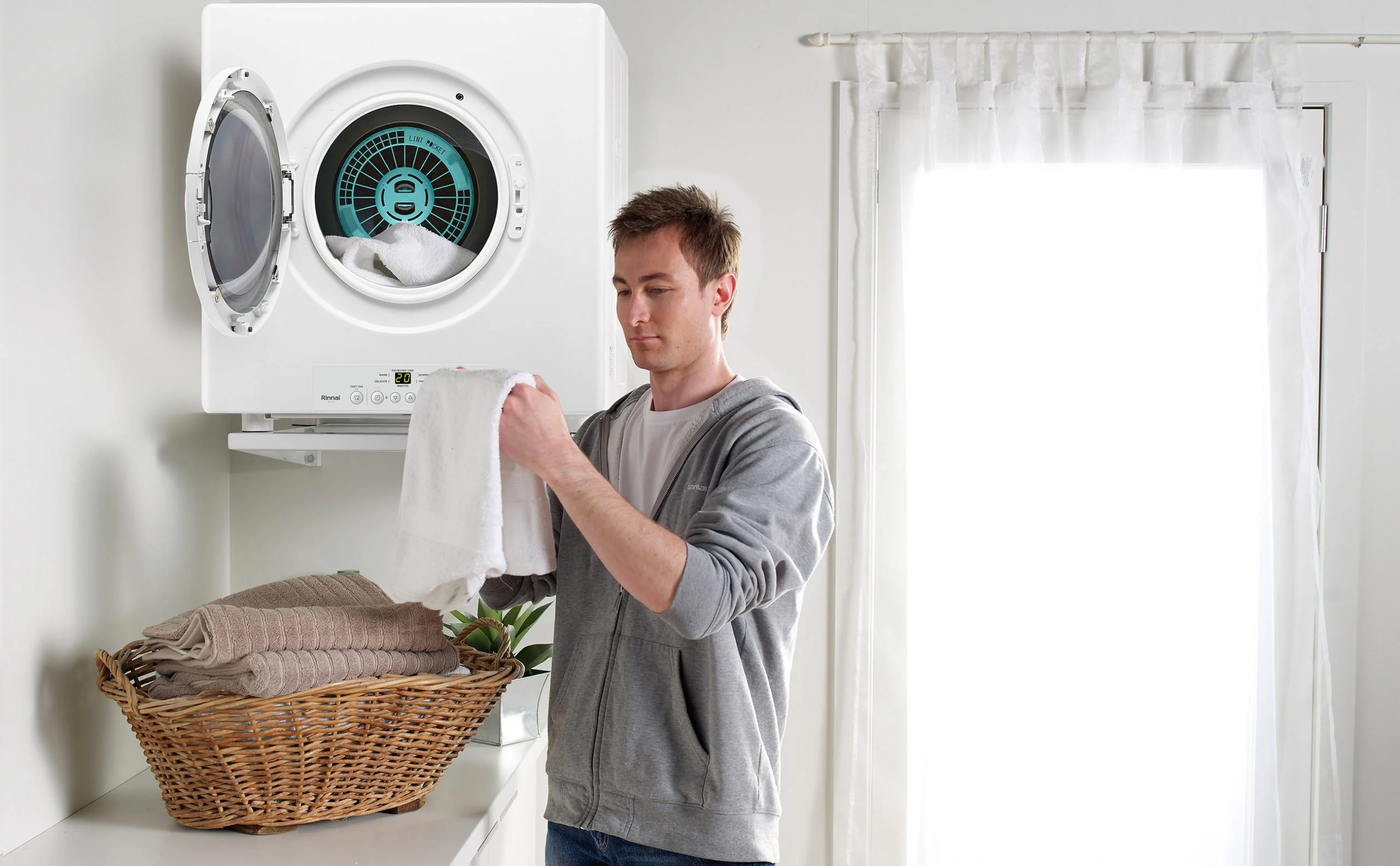 Rinnai-Dry-Soft�-Gas-Dryer-New-Version-Door-Open-Wide-View-with-Man-scaled